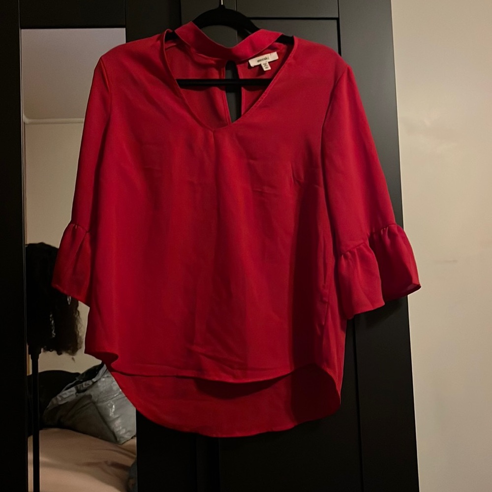 Red blouse with v neck and neckline